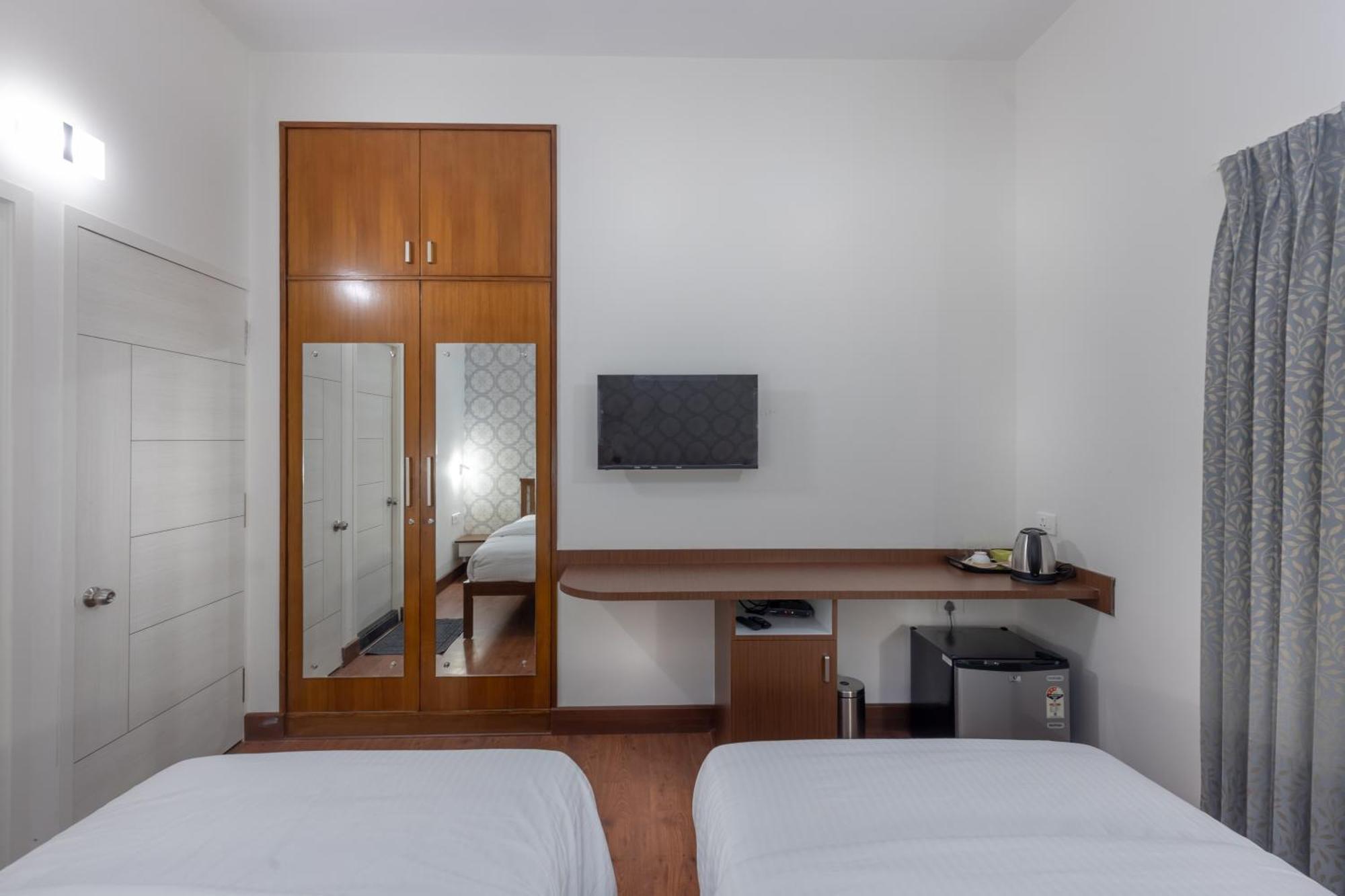 Ixora Suites Bengaluru Kültér fotó